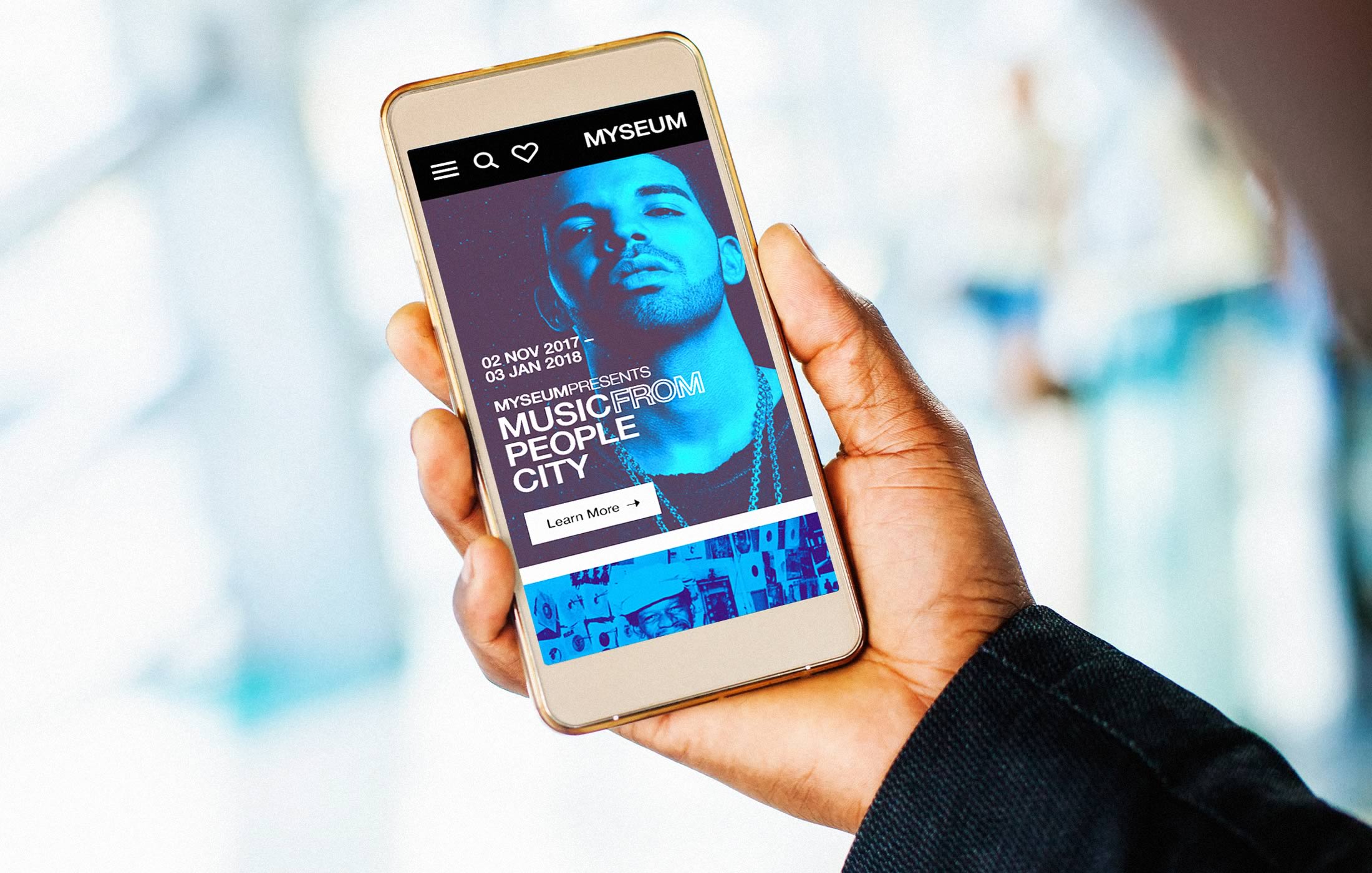 Closeup of a person interacting with the Myseum website on their mobile phone