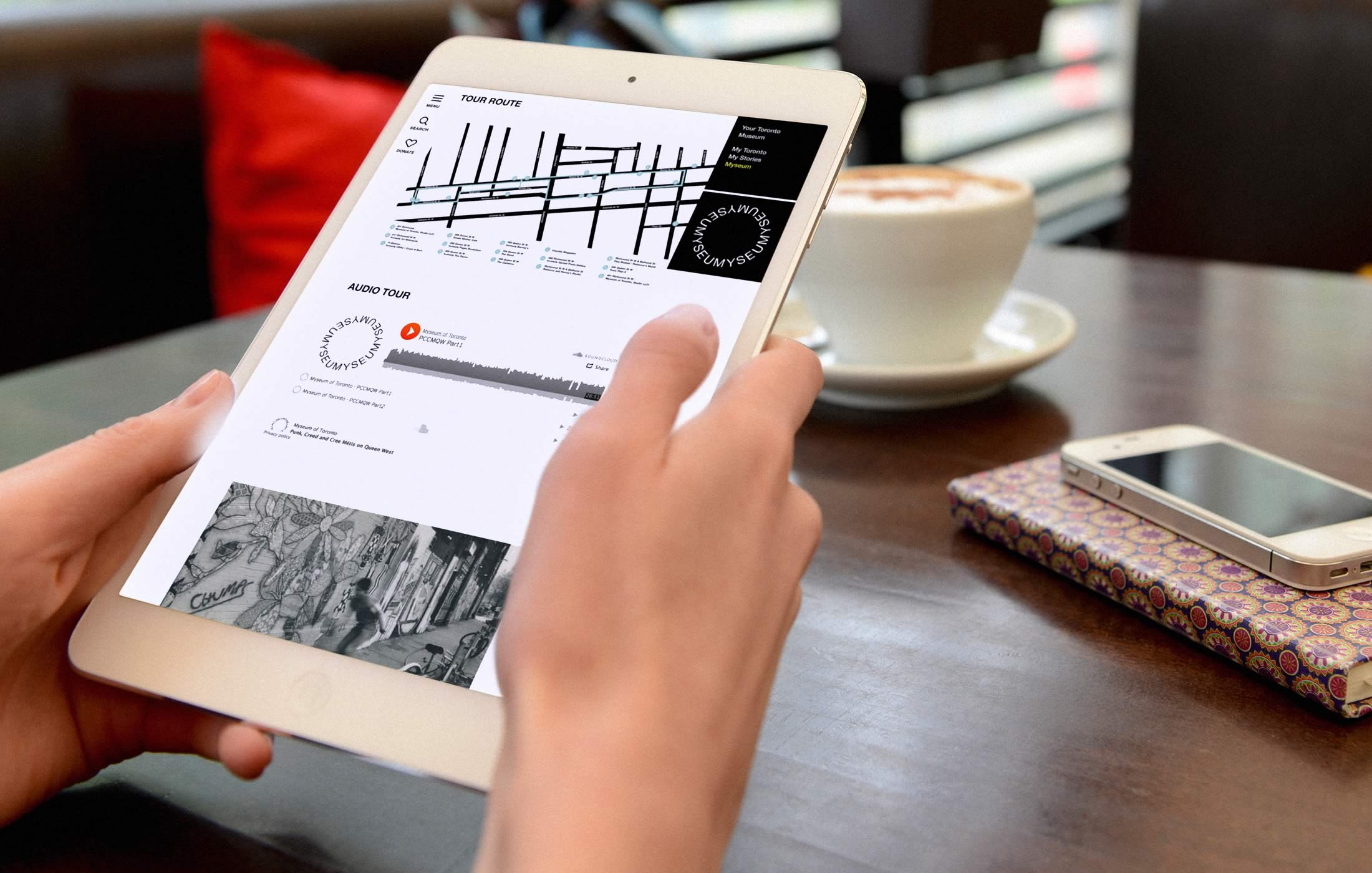 Closeup of a person interacting with the Myseum website on their tablet