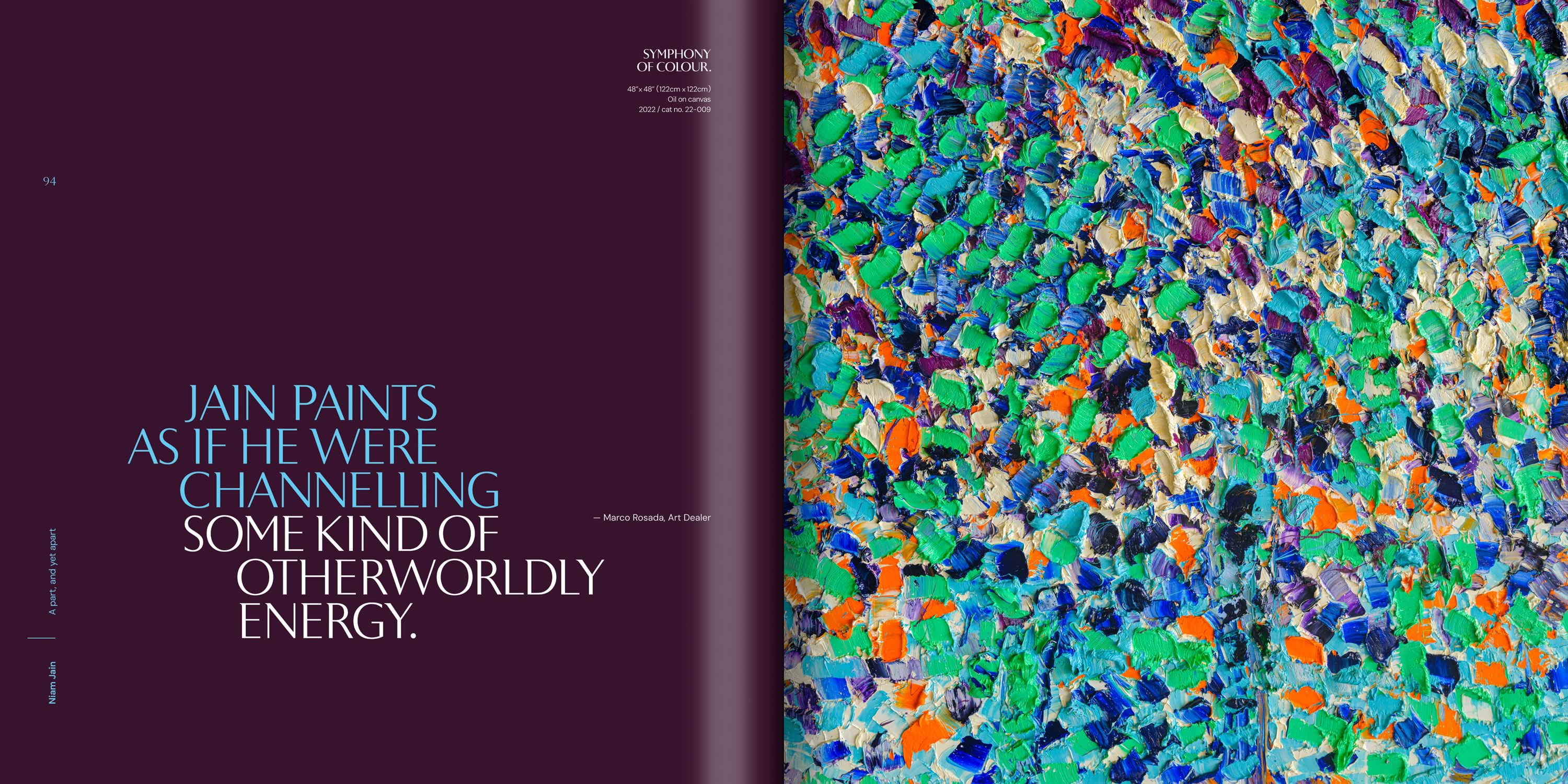 Image of two men hugging amongst a larger crowd of young adults (upon completion of an outdoor trek)