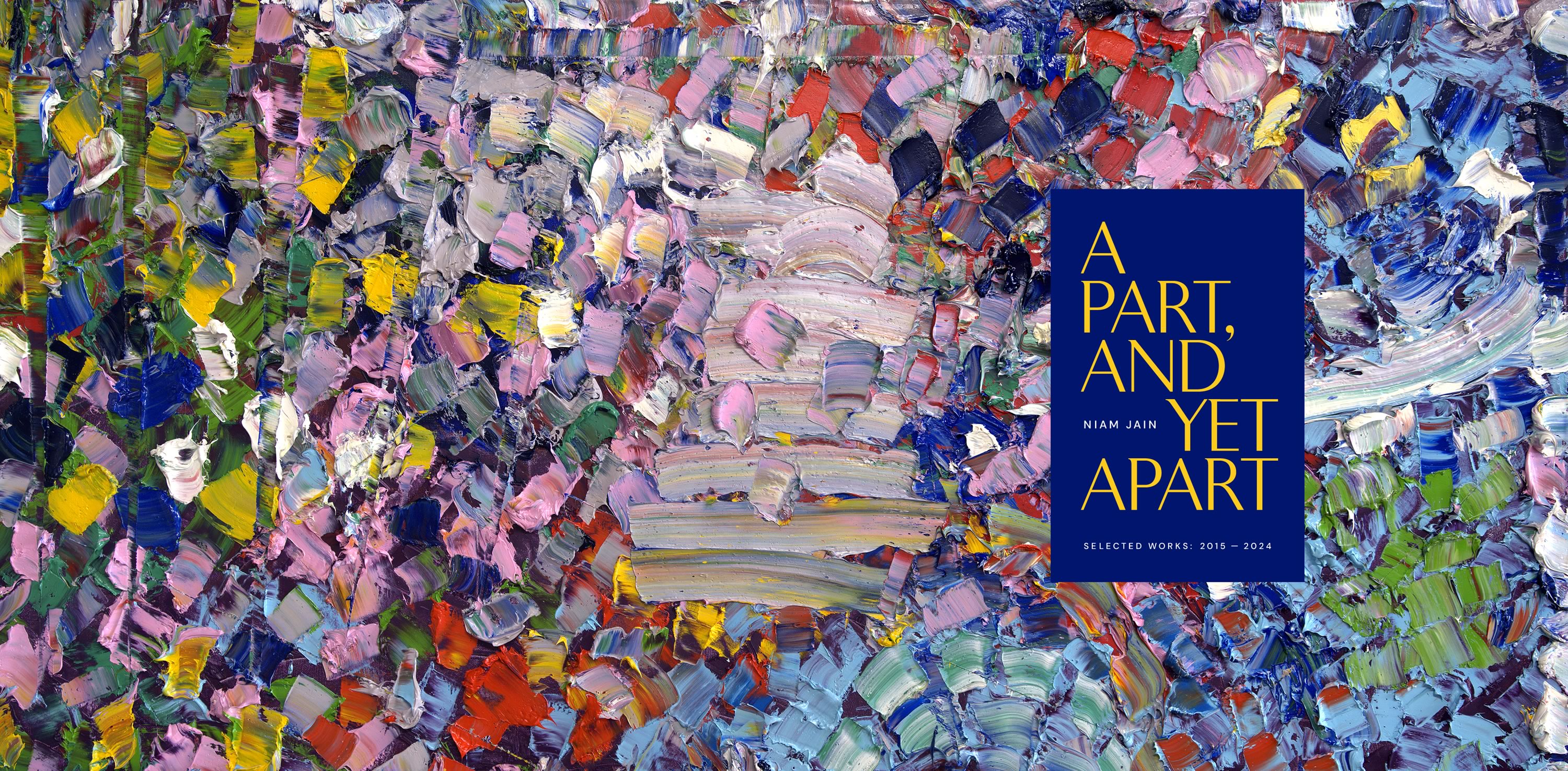 Image of two men hugging amongst a larger crowd of young adults (upon completion of an outdoor trek)