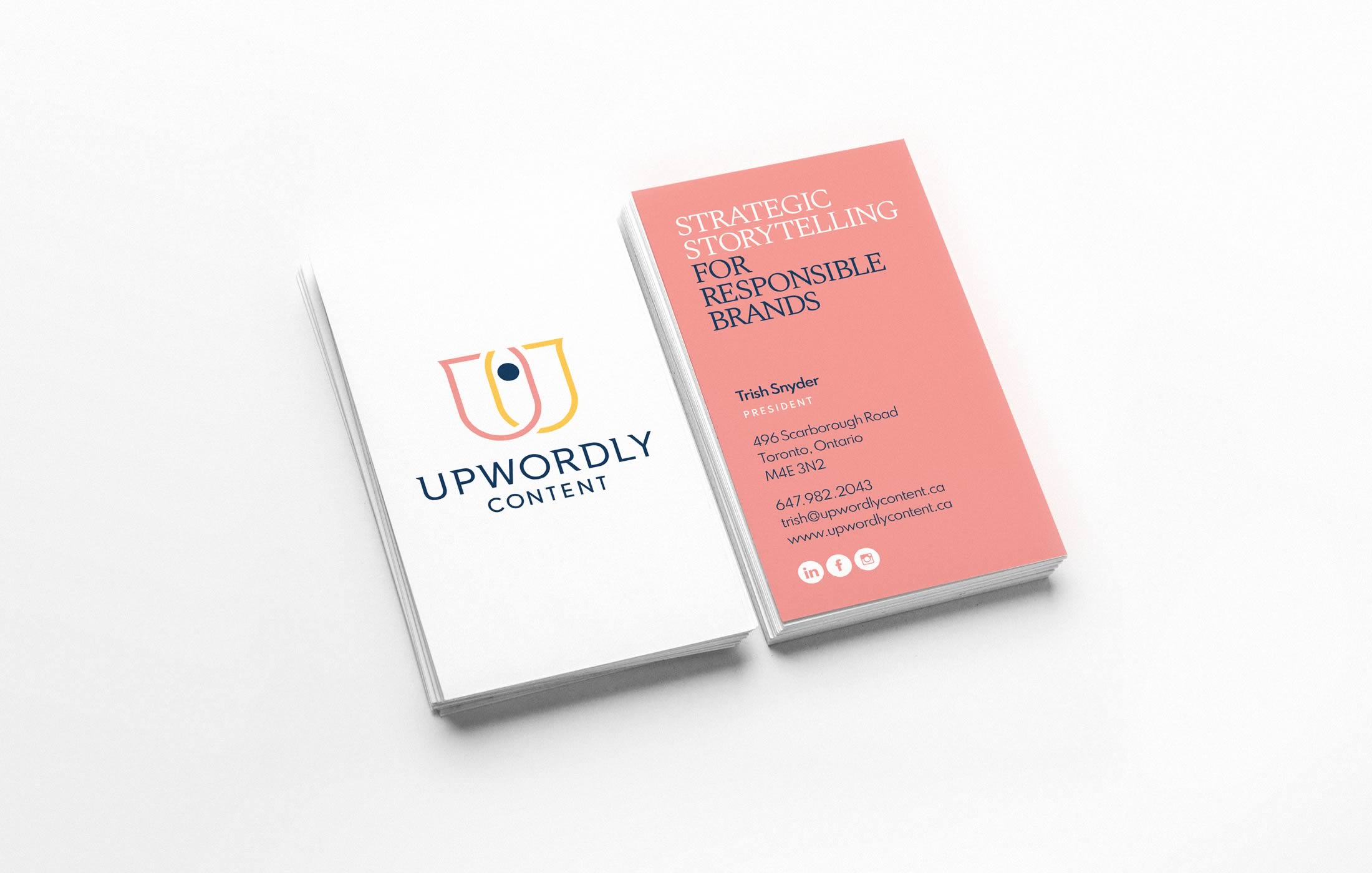 Photograph of the Upwordly Content business card, front and back