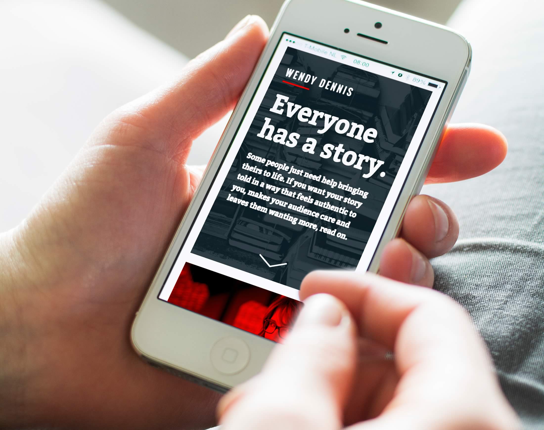 Closeup of a person interacting with Wendy Dennis’ website on their mobile phone